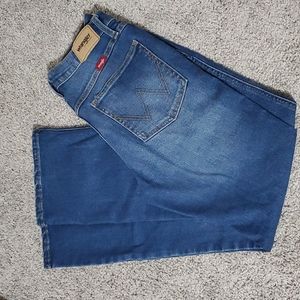 WRANGLER boot cut mid rise medium wash jeans